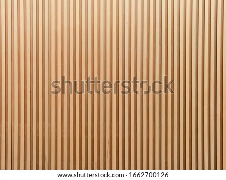 Interior wall cladding made from strips of plywood - wall texture Royalty-Free Stock Photo #1662700126