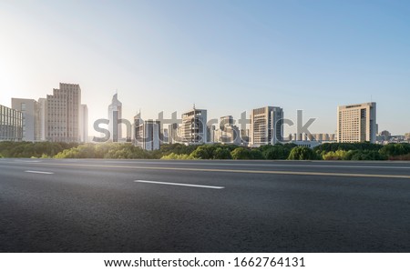 Asphalt road and urban architectural landscape of Ningbo

 Royalty-Free Stock Photo #1662764131