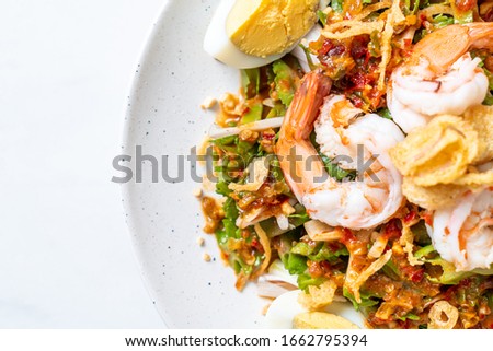 Wing Bean or Betel Nuts Spicy Salad with Prawns and Shrimps - Thai food style
