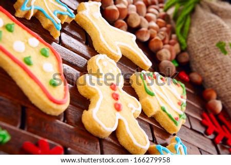Christmas still life with traditional gingerbread cookies on wood
