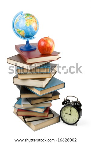Pile of books, alarm clock and apple isolated on a white background.  Concept for "Back to school"