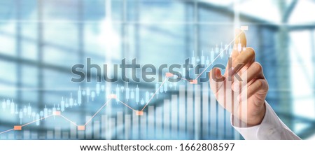 Businessman plan graph growth and increase of chart positive indicators in his business Royalty-Free Stock Photo #1662808597