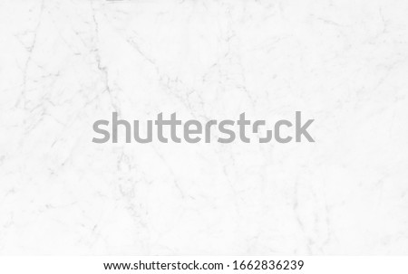 Abstract background from white marble texture with scratched. Modern and luxury material for decoration and construction building.
