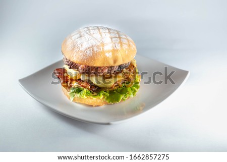 burguer with handmade bread on white background