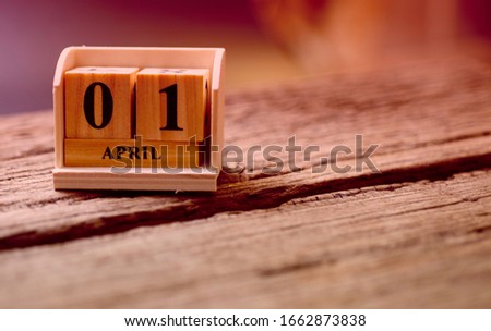April fool day, 1st April blurred  wooden calendar Royalty-Free Stock Photo #1662873838