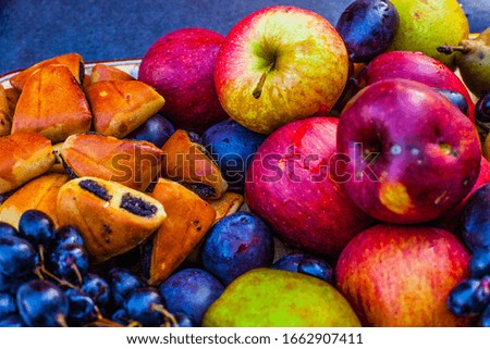 Bright tasty seasonal autumn fruits : apples, grapes and pears