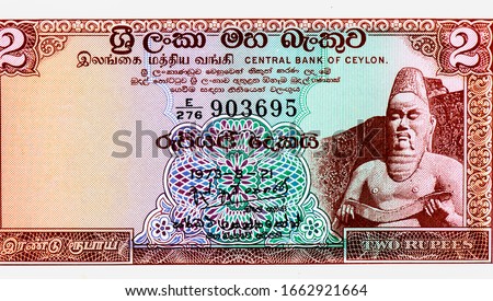 Statue of Parakramabahu I in Polonnaruwa. Portrait from Ceylon 2 Rupees 1973 Banknotes. 