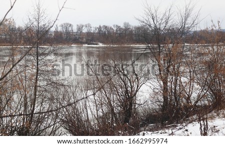 The river in the winter. Riverbanks in ice and snow