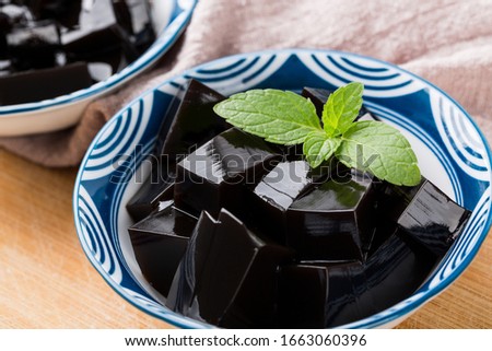 Closeup of traditional Chinese herb food Guiling Jelly. Guilinggao, a traditional Chinese Herb-Made Dessert.	