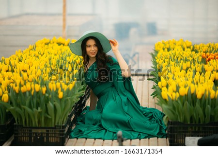girl in beautiful dress surrounded by flowers, full body and portrait, stock image, copy space