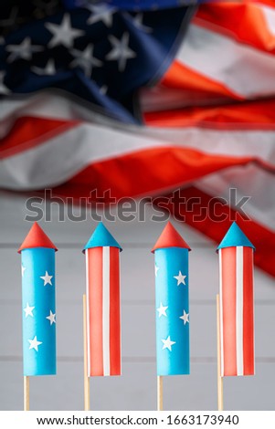 American Independence Day celebration banner with fireworks rockets made in american flag style