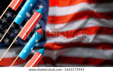 American Independence Day celebration banner with fireworks rockets made in american flag style