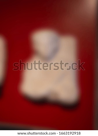 Abstract blurred slide background. Statue in museum. 