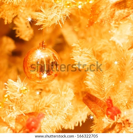 golden christmas ornaments on tree