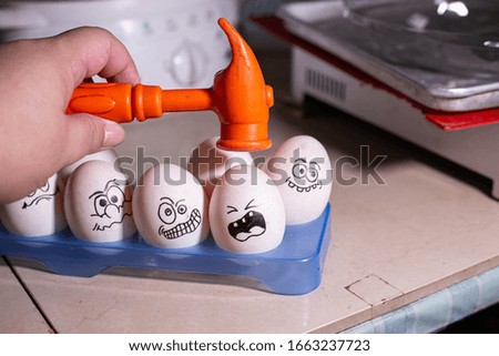 Fear That is about to be done. The egg that is about to be smashed with an orange hammer