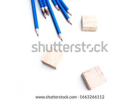 isolated image of pencil with wooden block.  education concept image.