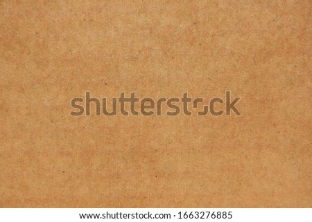 The texture wallpaper of a brown cardboard