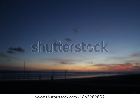 blurred jamaica beach sunset with blue sky and cloud