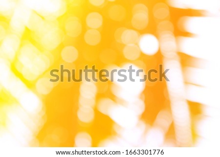Gradient yellow and orange colour coconut leaf graphic for modern design. Graphic resource. Copy space for design. for Background. Blur and bokeh