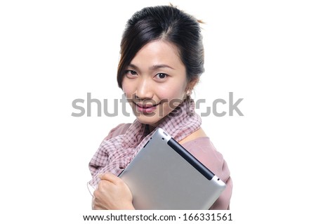 Asian business woman holding a tablet with smile.