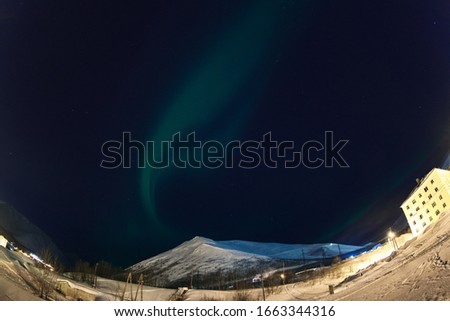 Polar arctic Northern lights Aurora Borealis activity in winter Finland, Lapland.
