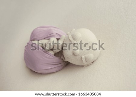 first photo shoot. doll mannequin newborn baby. doll for learning photography