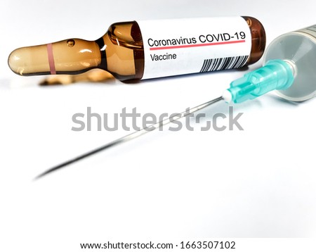 Vaccine concept for new Corona Virus Outbreak from China, Wuhan. Immunisation Vaccination for Pandemic Coronavirus in Medical Bottle storage and medical Syringe. Korona virus on White Background Royalty-Free Stock Photo #1663507102