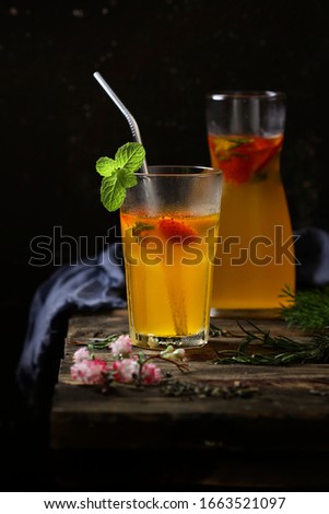 Orange Strawberry Juice stock photo in high quality HD image, an amazing thirst quencher for the spring season.