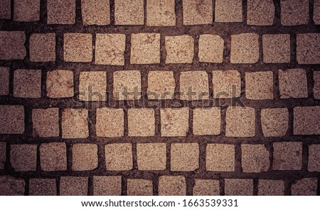 Texture of paving slabs closeup with tinted