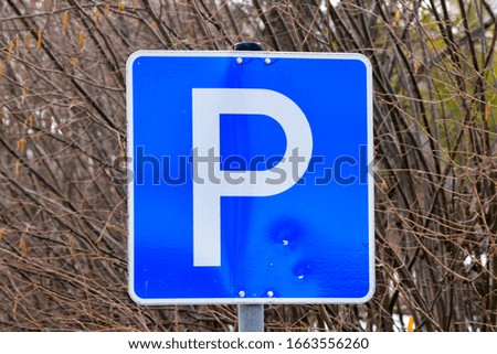 Blue parking sign letter. Road sign.