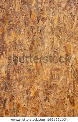 Plywood texture close up. Pressed wooden panel background