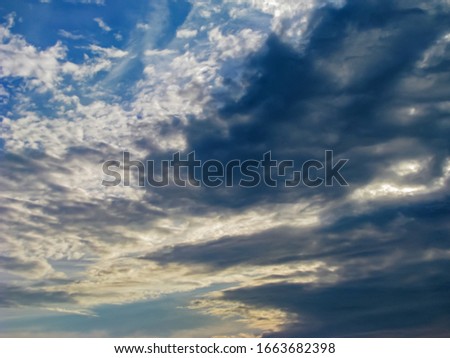 Curly, Dark Gray Cumulus and Thunderclouds Overtake the Azure Sky. They Created a Picturesque Relief Picture. You Can Use When Creating Collages and Compositions 