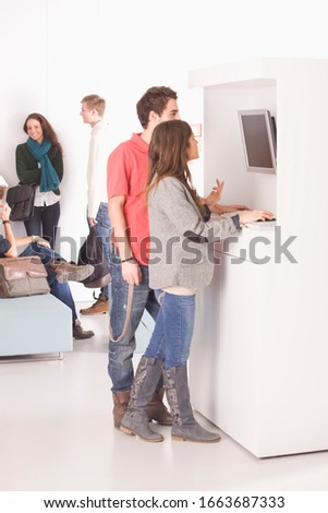 Young students working on computer in university