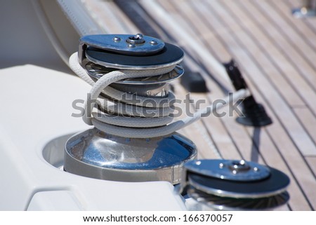 Sailboat winche and rope detail on deck