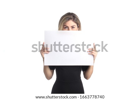 Beautiful woman covering face with white paper poster. Background for business, advertisement and companies. Mockup template portrait isolated on white.