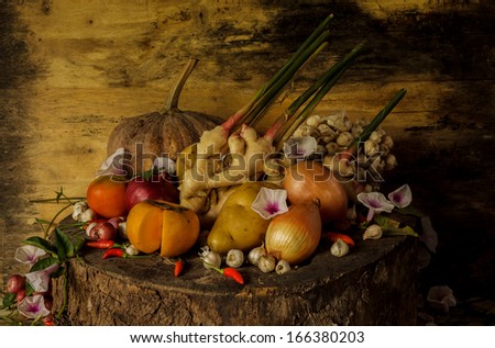 Still Life Photography with Spices, herbs, vegetables and fruits.  on Wooden Base