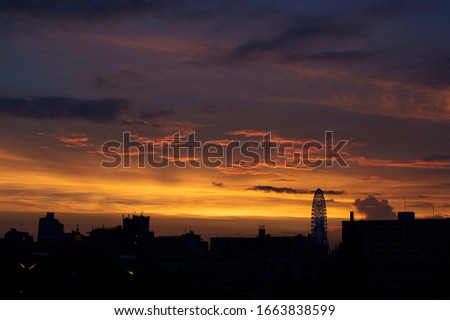 Coloured sky before dusk above the city