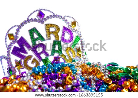 A Mardi Gras crown on a white background with colorful beads