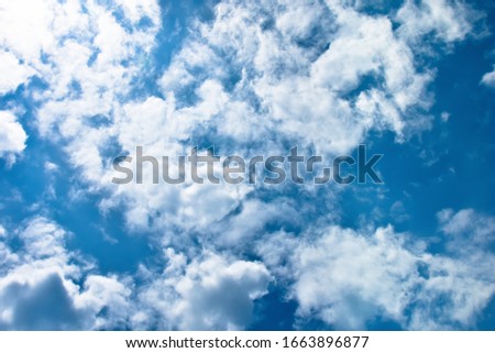 Blue sky and beautiful white clouds. Amazing. Background and wall paper.