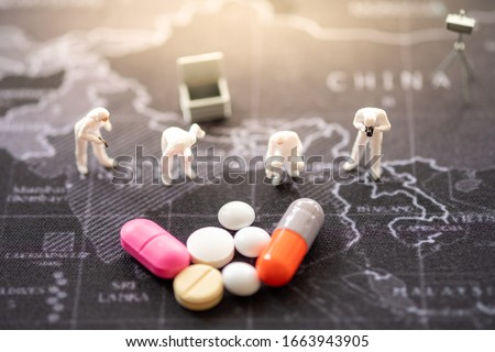 Miniature people: Worker support and drug with copy space using as background  , medical technology, business adviser, health care concept.