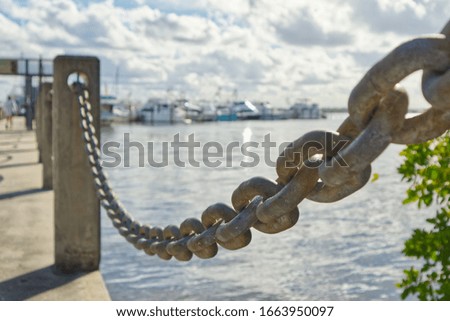 A dock chain keeps people from falling into the water in Florida