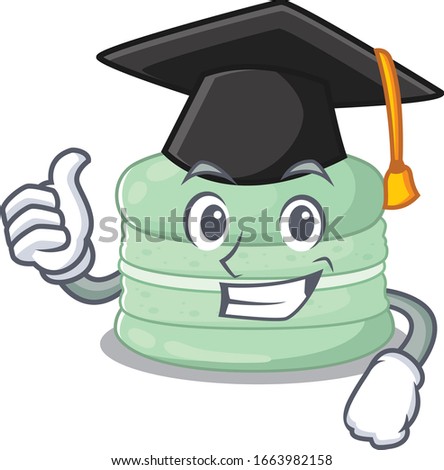 happy and proud of pistachio macaron wearing a black Graduation hat
