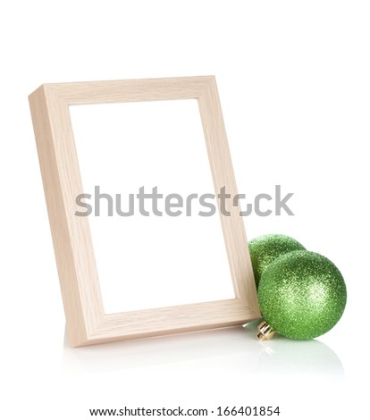 Photo frame and christmas baubles. Isolated on white background