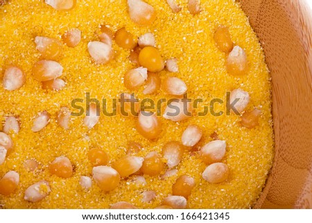heap of cornmeal maize flour surface texture background 
