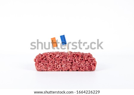 Fresh minced meat with a french flag sticking in it
