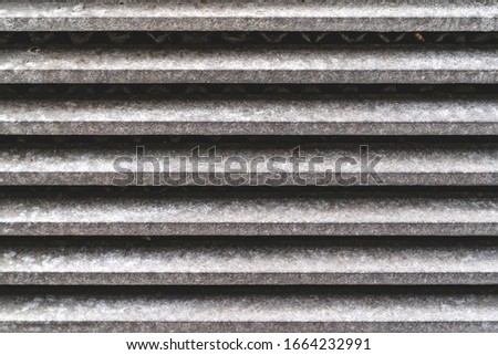 Iron sewer grate texture background. Horizontal lines 