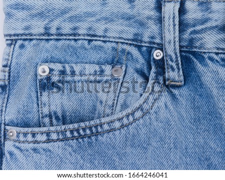 blue jeans front pocket,close up 