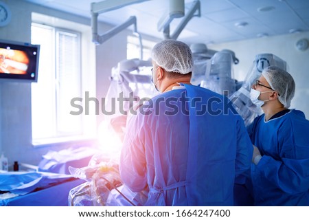 Modern surgical system. Medical robot. Minimally invasive robotic surgery. Da Vinci Surgery. Royalty-Free Stock Photo #1664247400
