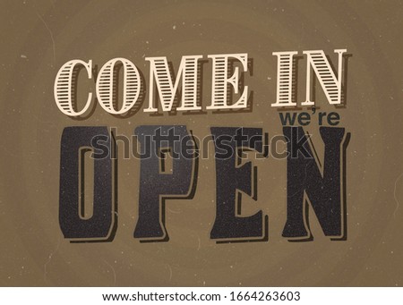 Vintage/retro come in we are open sign with brown background