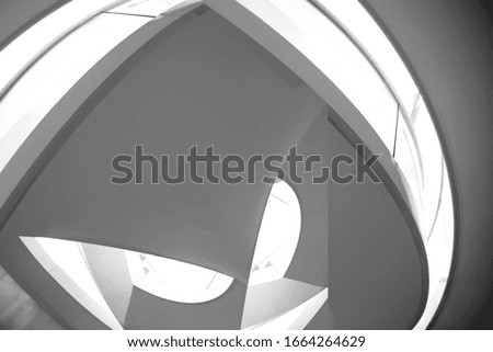 Collage photo of spiral staircase fragments. Abstract modern interior and business architecture with curved details. Minimal futuristic office background. Geometric composition of irregular curves.